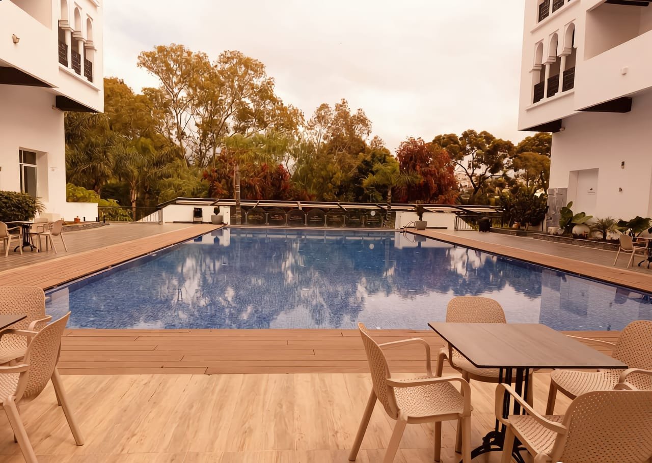 Nawrass holiday camp in Tangier, Mediterranean coast, Morocco — view of the campus pool