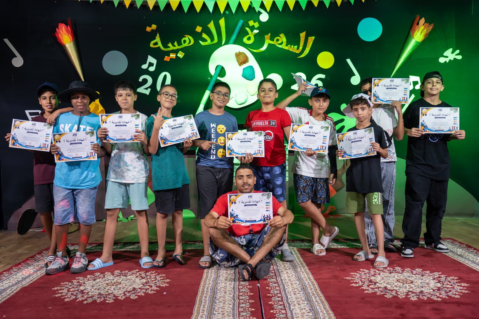 Boys receiving certificates